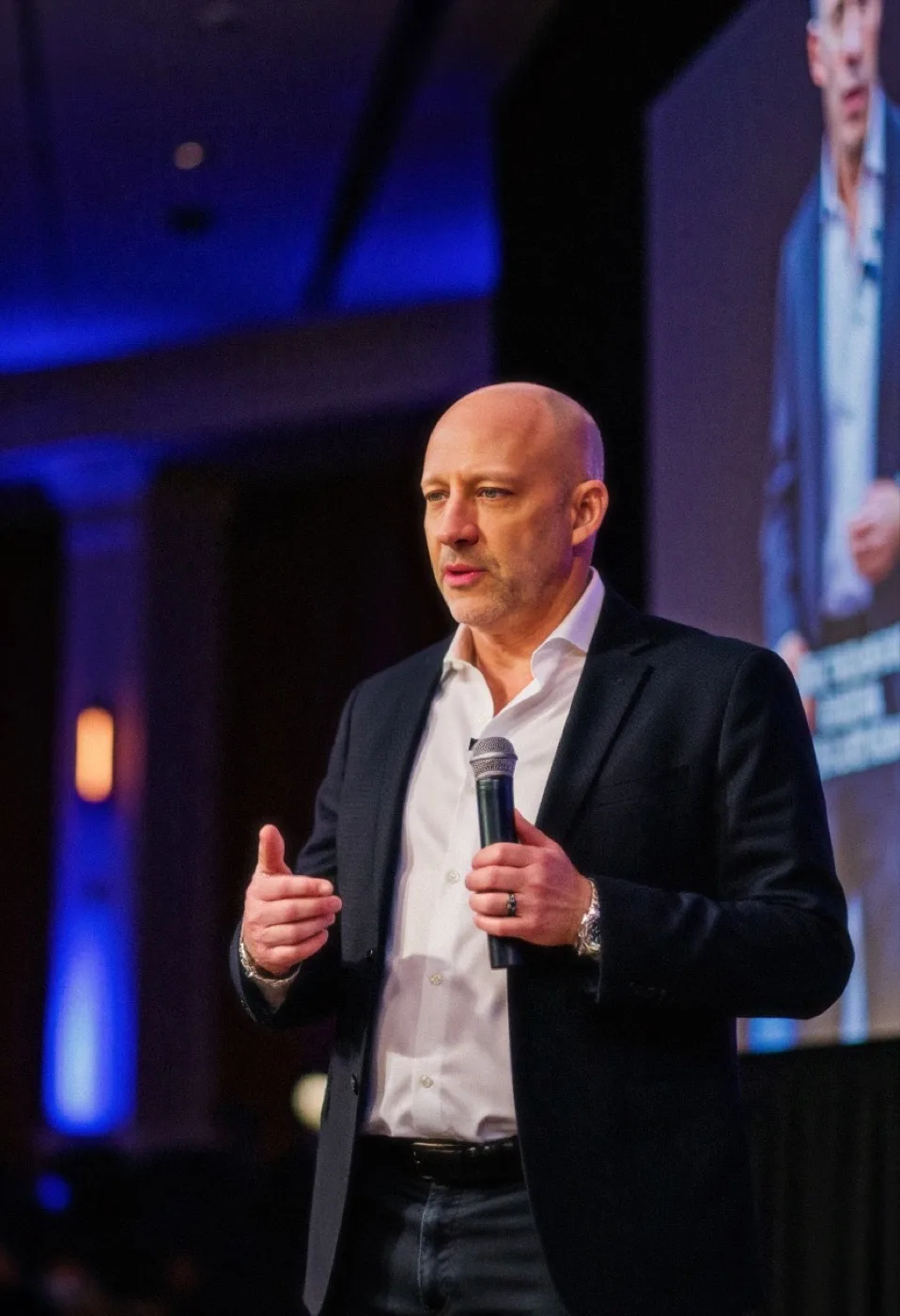 Chris Daigle speaking on stage